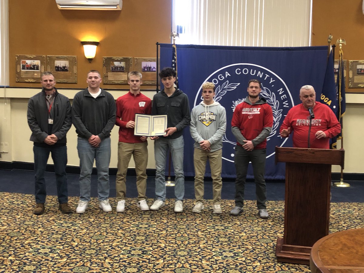 Tioga County Legislature Dennis Mullen presents the Waverly Wolverine State Champion Football team with a county proclamation! #wcsdletsgo
