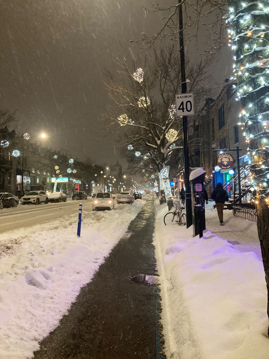 Lovely ride home thru the snow storm this evening thanks to well-maintained, protected bike paths. #polmtl #velomtl