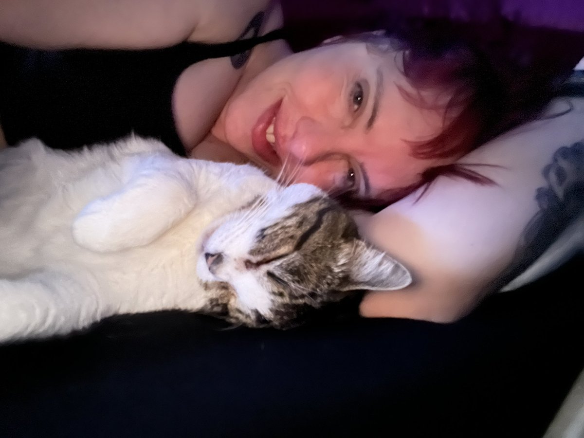 2024 365 Project (8/365) I am sneaking an early morning pic. She comes up a little before i get up (usually 2am). If I hold her long enough she falls back asleep. #disasterunicorn #TallyGoblinQueen #project365 #tally #transselfie #trans #selfie