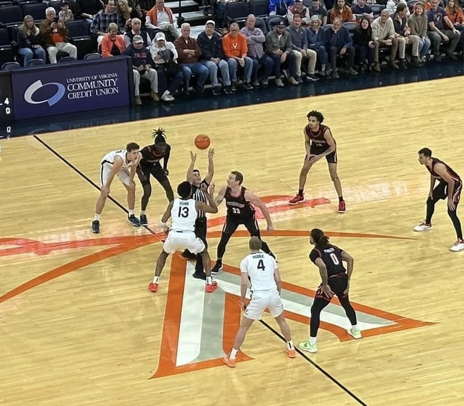 Former CBOA official Adam Flore with the opening toss.