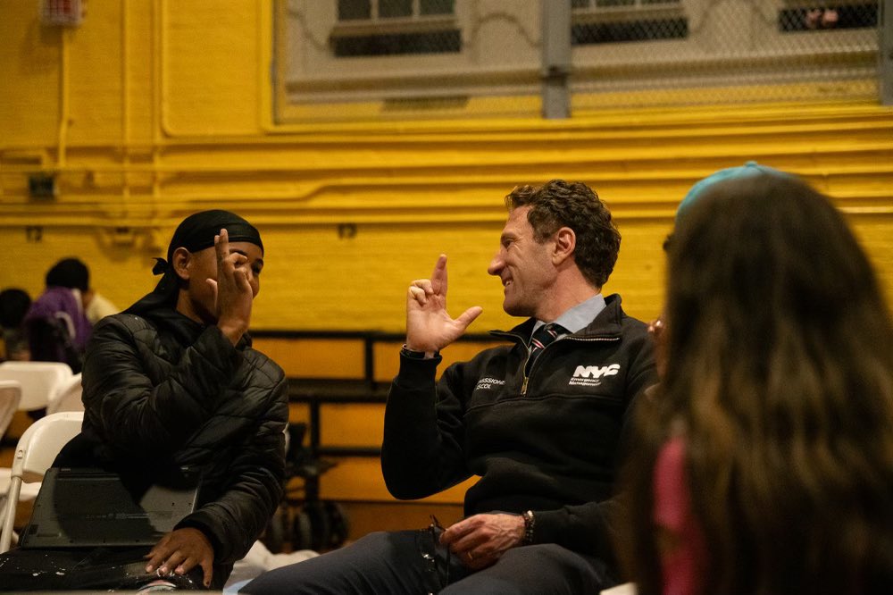 NYCMayor's tweet photo. On the ground at James Madison High School. Our @nycemergencymgt, @nychealthsystem, and @nycschools teams are doing a great job keeping asylum seekers safe and dry before they depart tomorrow morning. https://t.co/VKMWrnJvLR