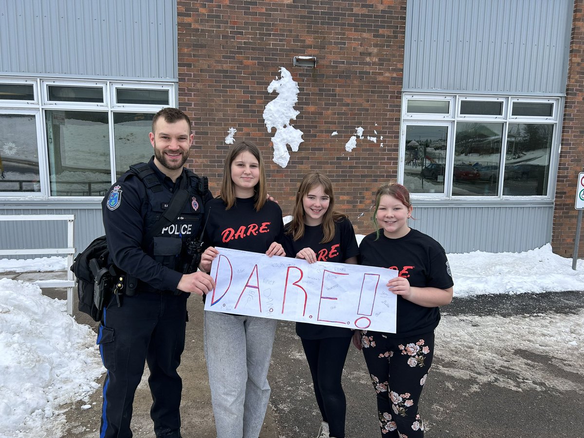 sjboscoschool's tweet photo. So proud of our Grade 6 students who officially graduated from the DARE program today! Their hard work paid off and the lessons learned will guide them to make safe and healthy choices! Thanks to our staff and @RNC_PoliceNL for making this happen! @NLESDCA #partnerships https://t.co/buiEkjYqtm