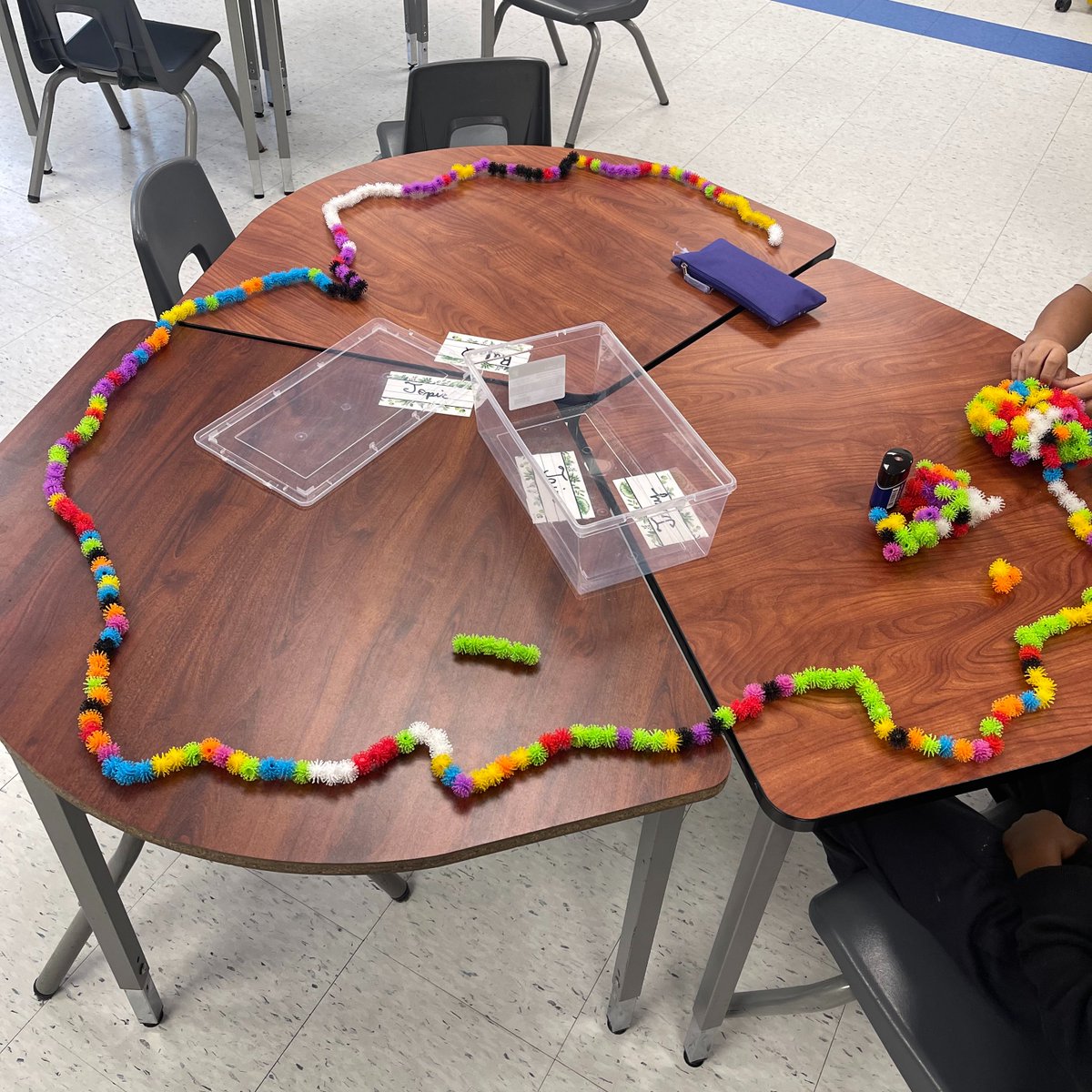HeronGateELC's tweet photo. The School Age group are loving these "Bunchems" for creative play! They created a very large snake using all of the material, they wanted to make the snake as big as the table. Check out the snake's big head on the far right! #STEMeducation #PlayBasedLearning #EarlyChildhood https://t.co/AQZpUFhHsw