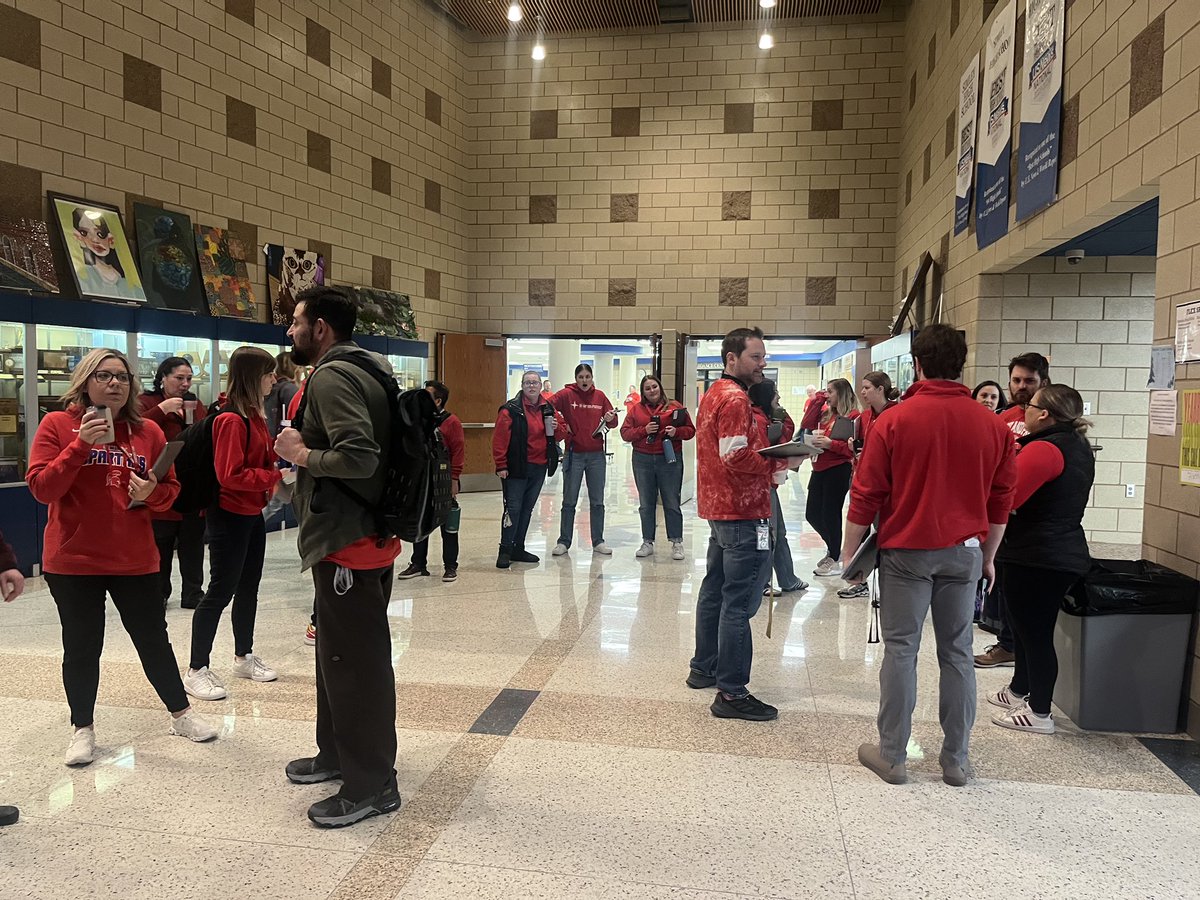 EDMNIGH1718's tweet photo. #EDMN-IGH members at Simley wearing red and organizing before weekly PLC meetings! https://t.co/puXKjbUNEI