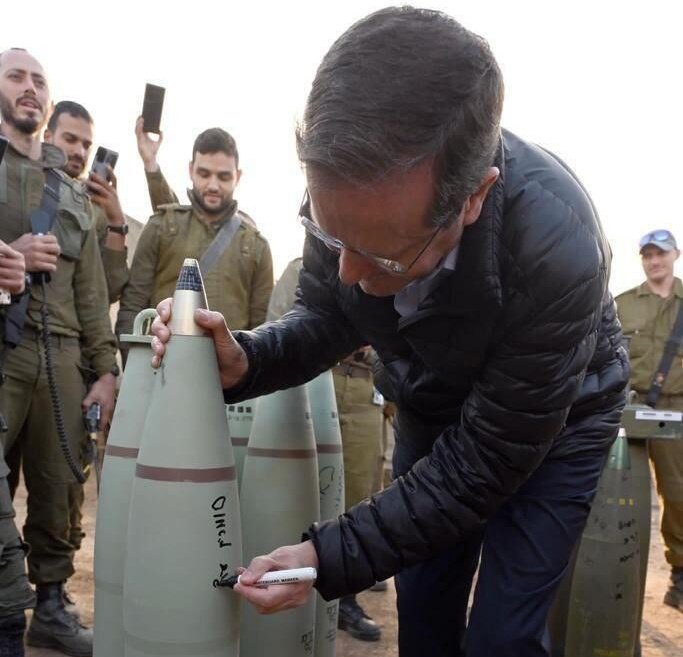 Labour politicians smiling alongside a man who is autographing bombs being dropped on children in Gaza.

How utterly grotesque.