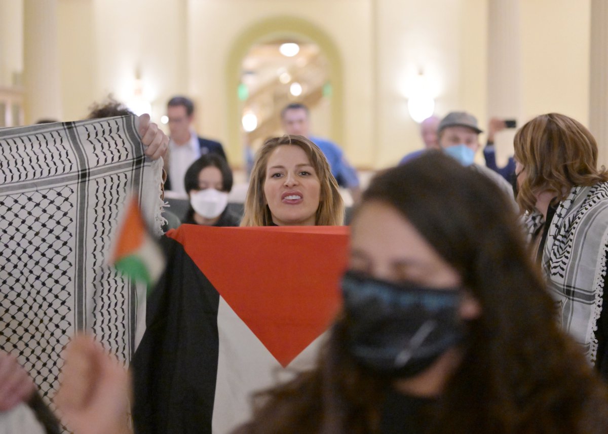Pro Palestine protesters are escorted out of the Colorado State Capitol during the first day of the Colorado General Assembly’s 2024 session in Denver, Colorado on January 10, 2024. <a href="/denverpost/">The Denver Post</a>