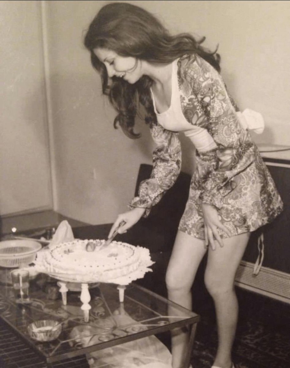 FunnySight's tweet image. Woman cutting her birthday cake in Iran 1973, 5 years before the Islamic Revolution