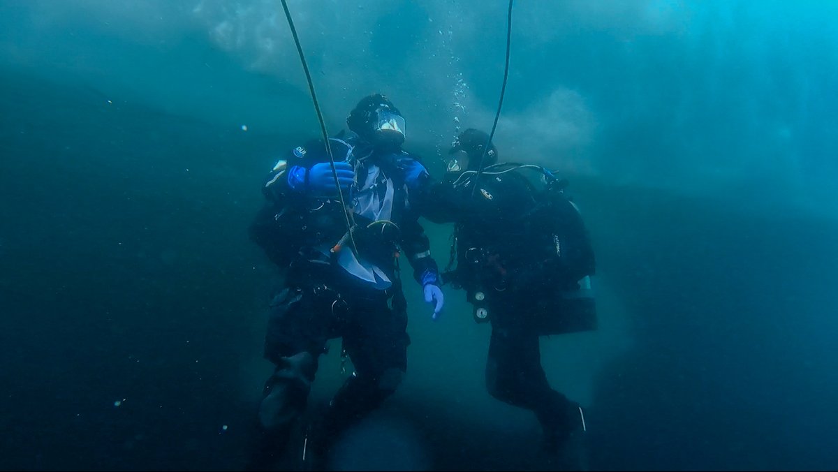 USCGPACAREA's tweet photo. Chilling feats in Antarctica! This week, @USCG divers conducted the 1st dive ops of 2024 aboard USCGC Polar Star while in McMurdo Sound supporting #ODF24. The divers held an under-the-ice advancement, a historic FIRST for Coast Guard divers in Antarctica! #USCG #CGatSea https://t.co/1FW92NnbEp