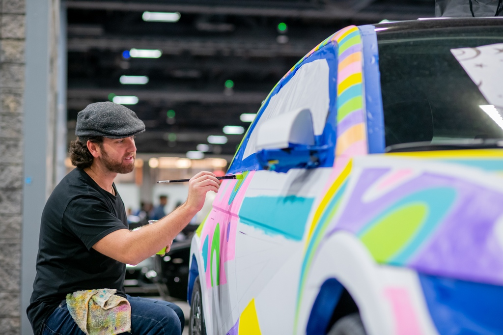 Get ready to witness the fusion of automotive innovation and artistic brilliance with real-time painted automobiles, jaw-dropping custom motorcycles, classic cars that redefine time, and awe-inspiring murals that paint the town with creativity with Art-of-Motion.