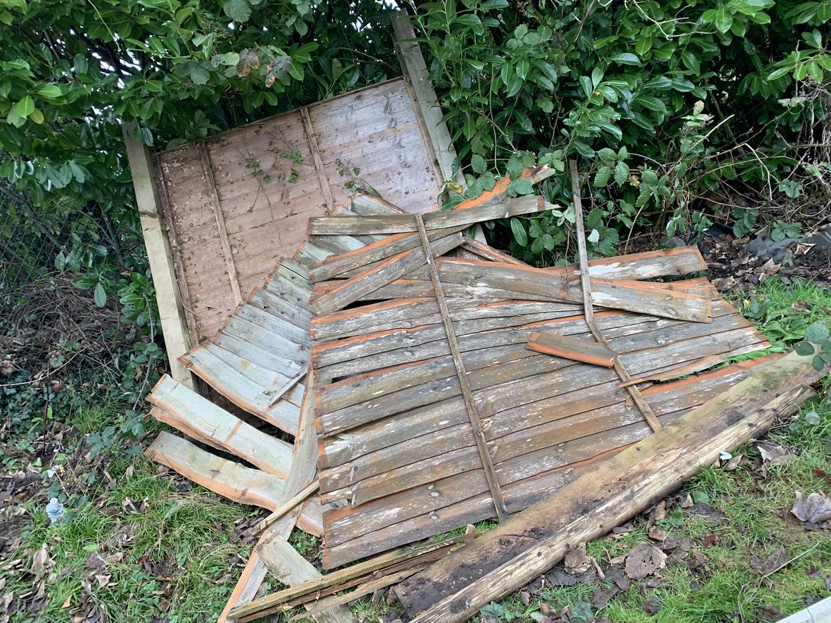 NakedGardener75's tweet photo. Replacing a very broken fence with some lovely new panels. Challenging in a blizzard but at least we had the fire going 😄 #GardeningTwitter #GardeningX #Fencerepairs #WINTER https://t.co/nOfsdsf2V0