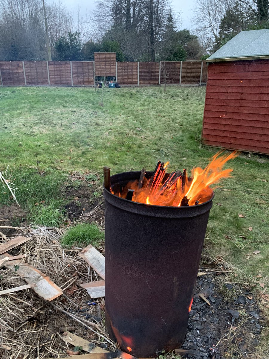 NakedGardener75's tweet photo. Replacing a very broken fence with some lovely new panels. Challenging in a blizzard but at least we had the fire going 😄 #GardeningTwitter #GardeningX #Fencerepairs #WINTER https://t.co/nOfsdsf2V0
