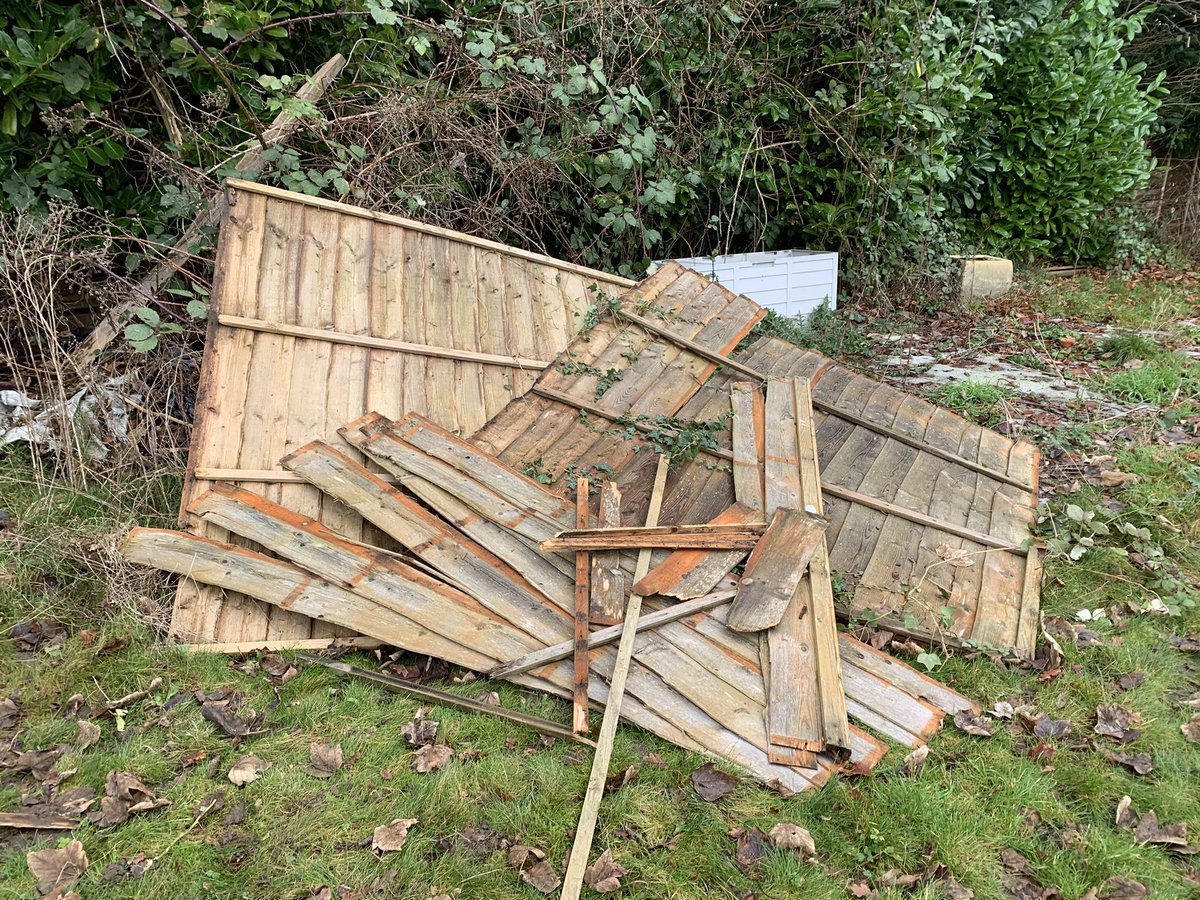 NakedGardener75's tweet photo. Replacing a very broken fence with some lovely new panels. Challenging in a blizzard but at least we had the fire going 😄 #GardeningTwitter #GardeningX #Fencerepairs #WINTER https://t.co/nOfsdsf2V0