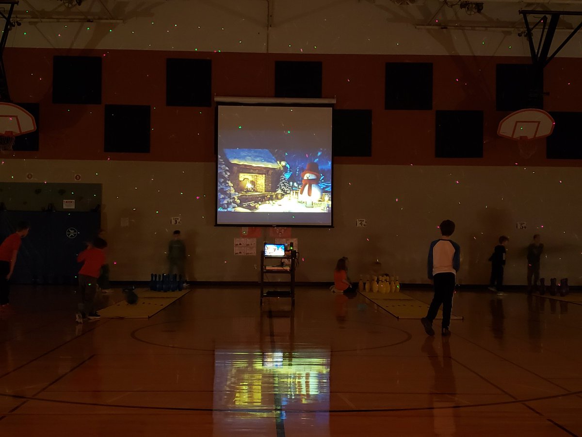 4th grade #sayresharks are Bowling for Marshmallows using linking cubes.  They are also playing with glow bowling lights on and a fun snowy scene display!  <a href="/SLCSSayre/">Sayre Elementary</a> we ❤ to bowl in #physed!  #SLYONphysed