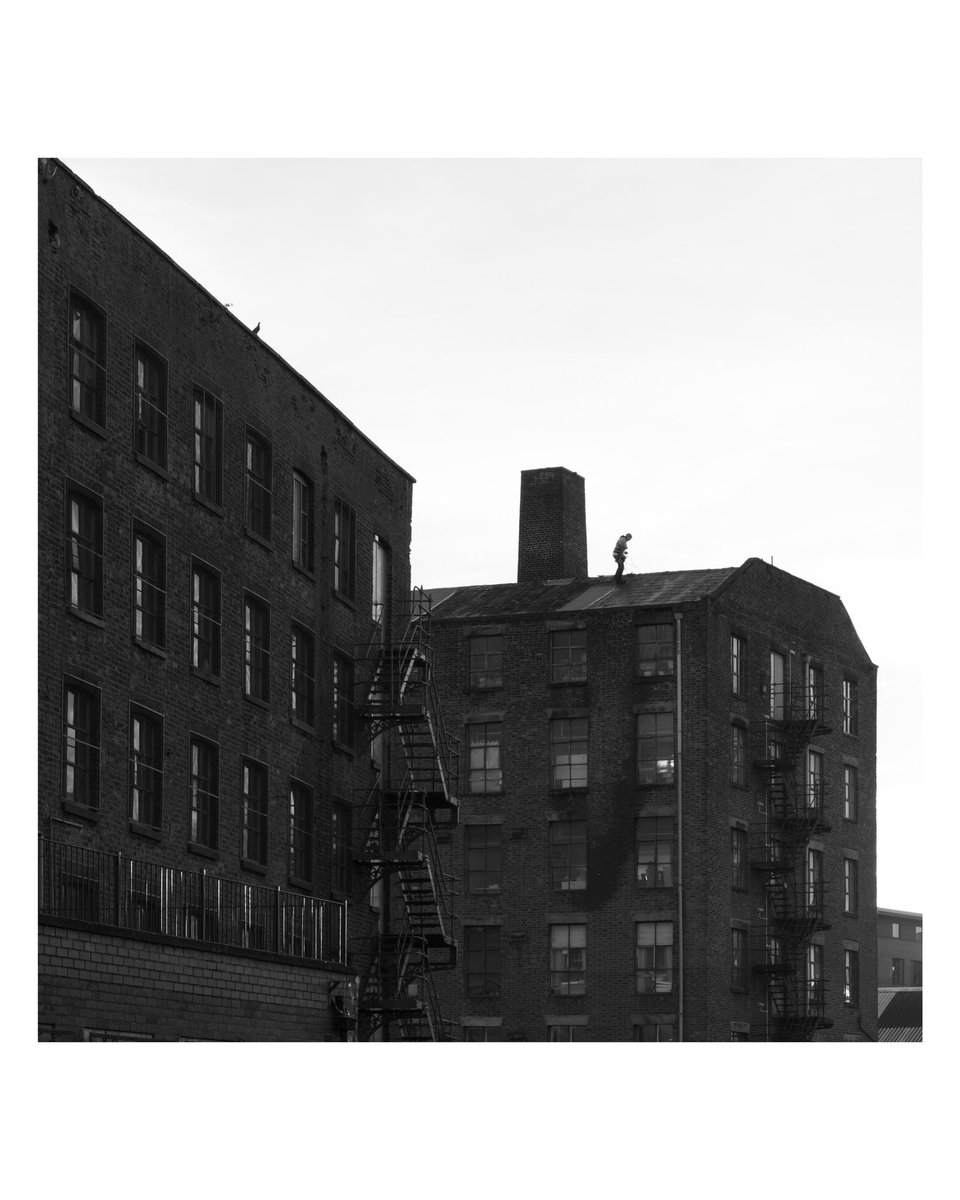 Man on roof #manchester on #oldwarehouse #oldbuilding #exploremanchester #urbanphotography