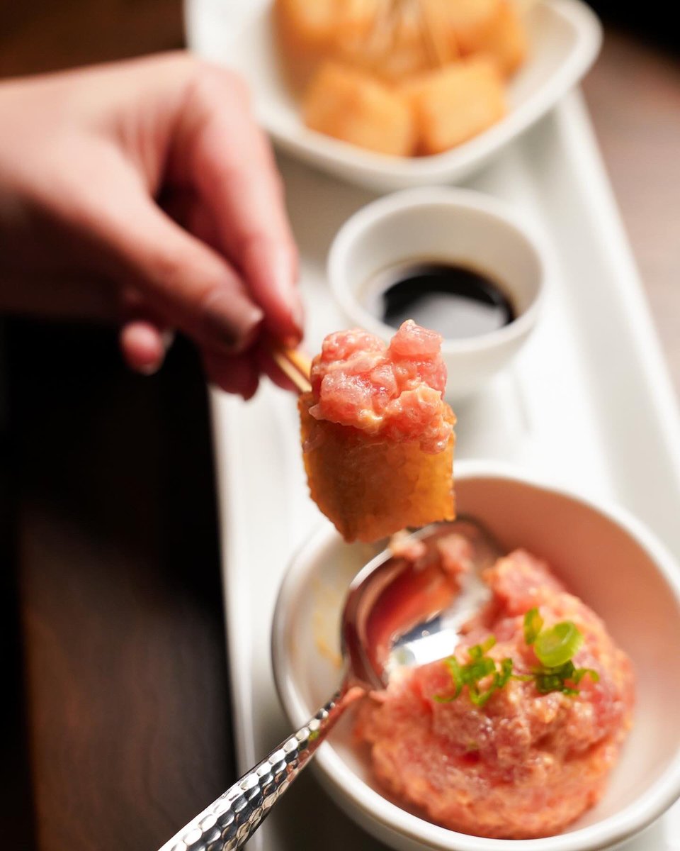 Our signature Crispy Rice with Spicy Tuna - a perfect balance of crunchy and tender, with melt-in-your-mouth spicy tuna delicately placed on a bed of crispy golden rice.