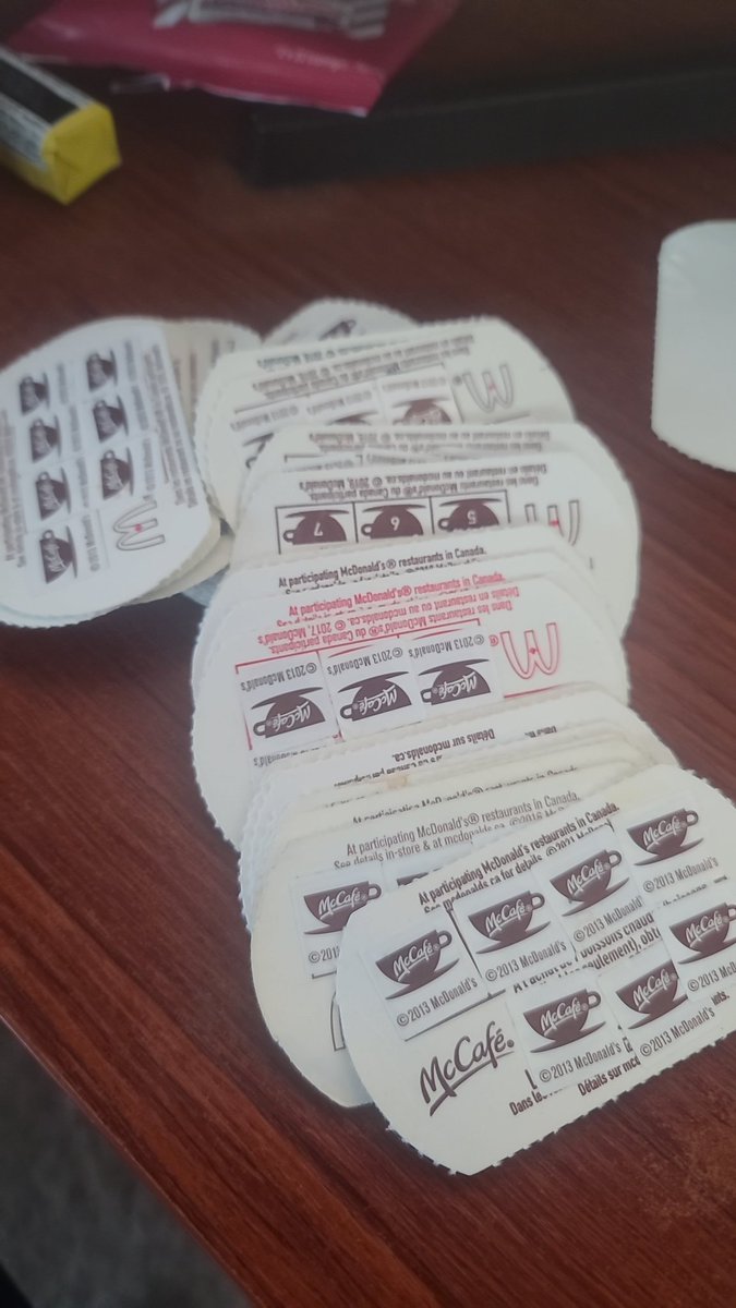 Justin_Dooley's tweet photo. @McDonaldsCanada  I found all these COMPLETED coffee stamps while packing up to move.  I know I just missed the end of the program but if I bring them in, think we can get some coffee to a food kitchen or something? https://t.co/EeFXU7IFx1