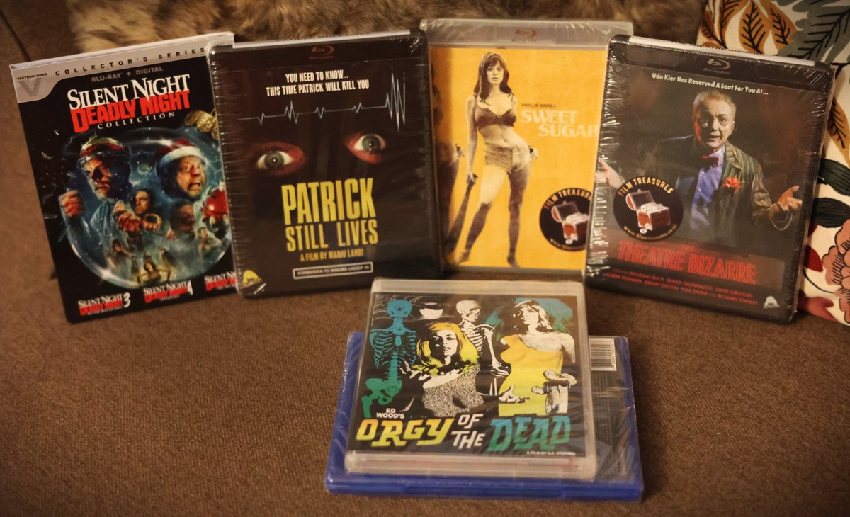@ajl__66 @FilmTreasuresUK Got my bits form the @FilmTreasuresUK sale. Can't wait to watch that bonkers Patrick *sequel*.😲 The one hidden underneath 'Orgy of the Dead' is a surprise for @lordRsBiscuits (No, Lord B, it isn't Nude Nuns with Big Guns 3-D)...💀👍👍