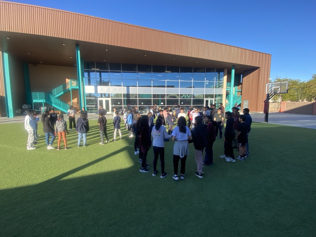 Tri-M learning how to create music together, feel the tempo, and the beat!