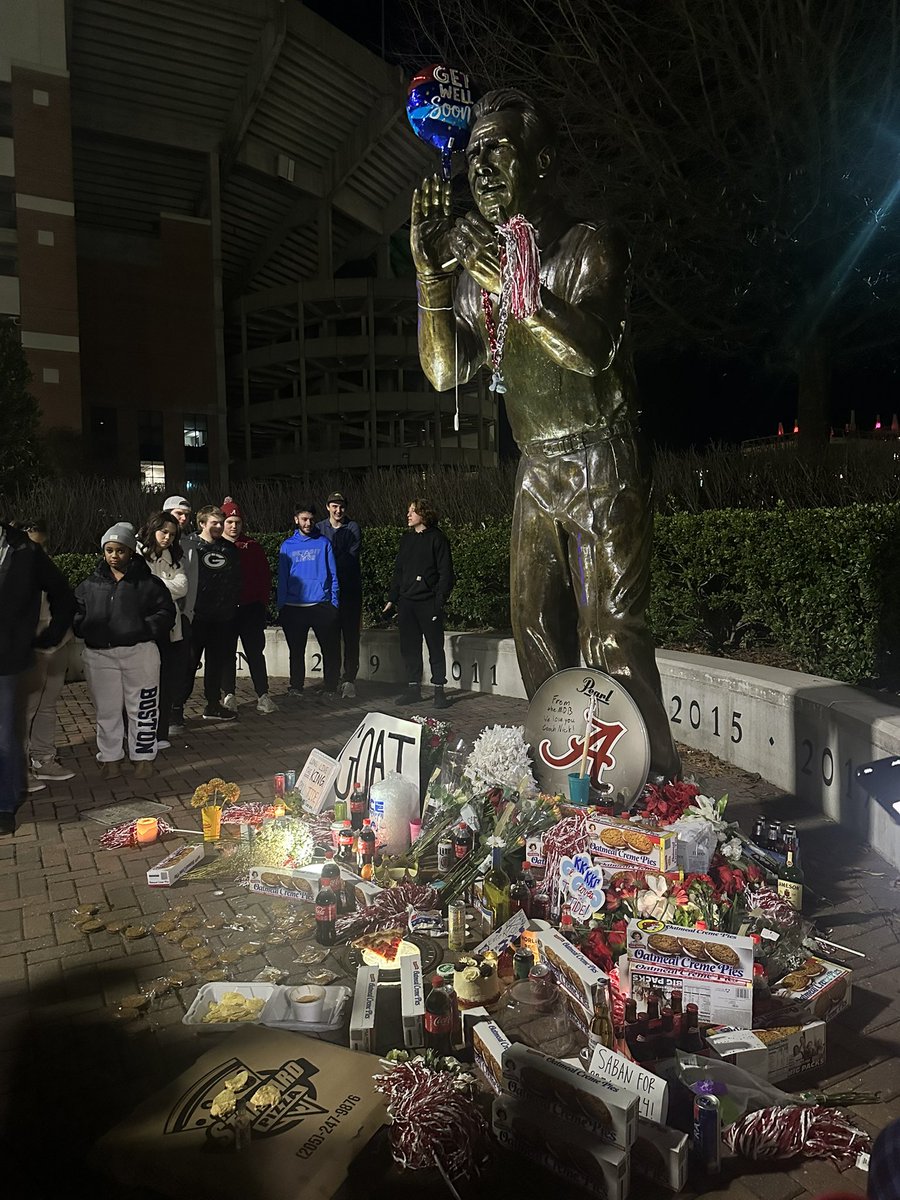 Scenes in Tuscaloosa tonight outside Bryant-Denny Stadium following Coach Saban’s retirement. Students and community members gathered together to leave items and sing songs honoring the legacy Saban has had at Alabama, as well as college football as a whole.