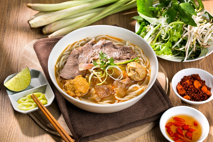 testusername4's tweet photo. Famous delicious dishes that you must try when coming to Hue - VIET NAM
Bun Bo Hue 

Your visit to Hue will be incomplete if you miss out on a bowl of bun bo Hue (Hue beef noodle soup). It is considered the most popular Hue food in Vietnam. https://t.co/K4rWguowdu