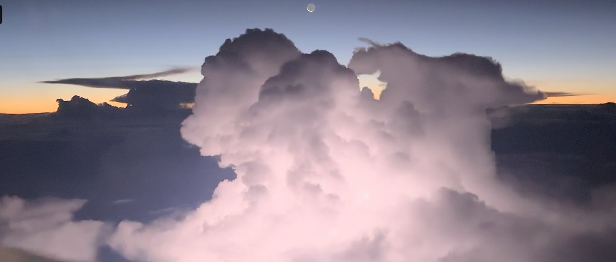 I had to post another photo of the thunderstorm we saw over Africa a couple nights ago lighting itself up internally with a massive flash of lightning as my #flyingphotooftheday Love tiny crescent of the moon visible above too. 😄 #viewfromtheflightdeck