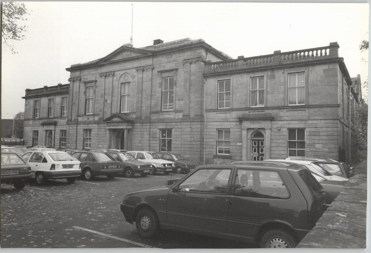 Taken today in 1993 #Dumbarton Sheriff Court. We're loving the selection of classic cars on show in the car park.
