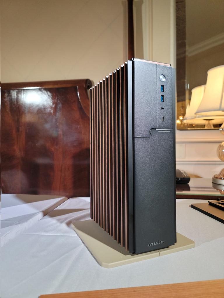 InWin's tweet photo. Day 3 of #CES2024 , This is the #InWin ModFree Mini, Timber edition! There will also be Monarch edition (Frosted acrylic panels) and Mesh edition. With a bracket, the ModFree Mini can be applied to a ModFree system or can be a standalone system, too. #CES #HTPC https://t.co/ONFwfNSHqA