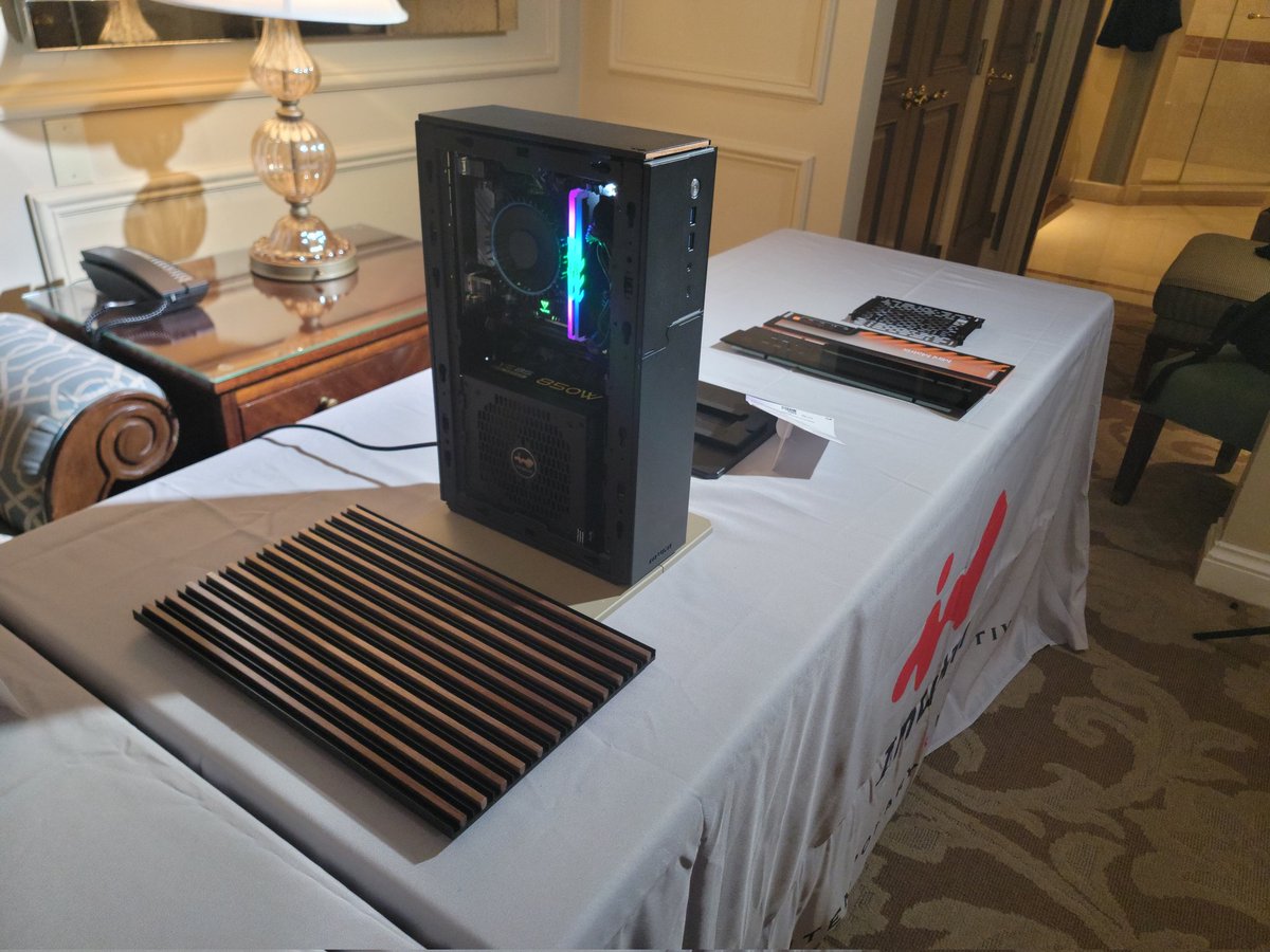 InWin's tweet photo. Day 3 of #CES2024 , This is the #InWin ModFree Mini, Timber edition! There will also be Monarch edition (Frosted acrylic panels) and Mesh edition. With a bracket, the ModFree Mini can be applied to a ModFree system or can be a standalone system, too. #CES #HTPC https://t.co/ONFwfNSHqA