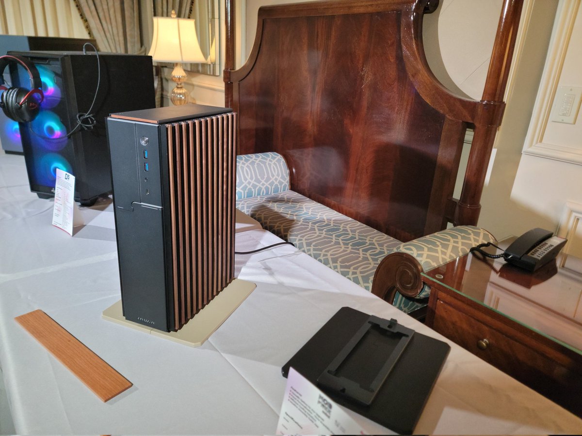 InWin's tweet photo. Day 3 of #CES2024 , This is the #InWin ModFree Mini, Timber edition! There will also be Monarch edition (Frosted acrylic panels) and Mesh edition. With a bracket, the ModFree Mini can be applied to a ModFree system or can be a standalone system, too. #CES #HTPC https://t.co/ONFwfNSHqA