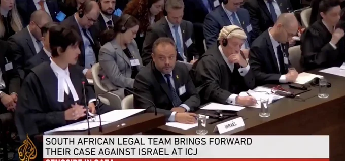Screenshot of the hearing at The Hague: South African representative addresses the court, next to the Israeli representative.