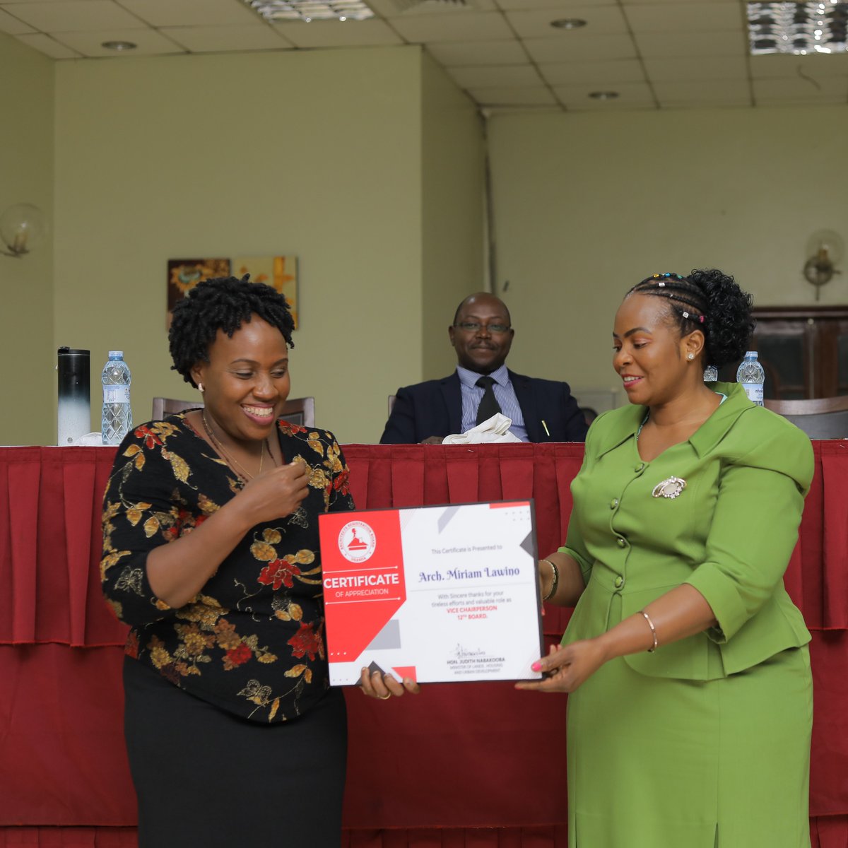 Out going Chairman @ARBUganda Arch. @kaigu55 and Vice Chair Arch. Miriam Lawino receiving their certificates of appreciation from the guest of Honor Hon Persis Princess Namuganza the State Minister @ministry_lands @ERBUganda @UgArchSociety @ministry_lands @GCICUganda