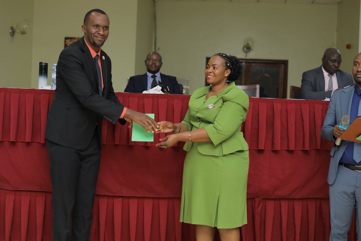 The incoming Chairperson Arch Miriam Lawino and the Vice Chairperson Arch. Jesse Tukacungurwa receiving their instruments of power. @ministry_lands @NBRBug @NPPBUG @UgArchSociety
