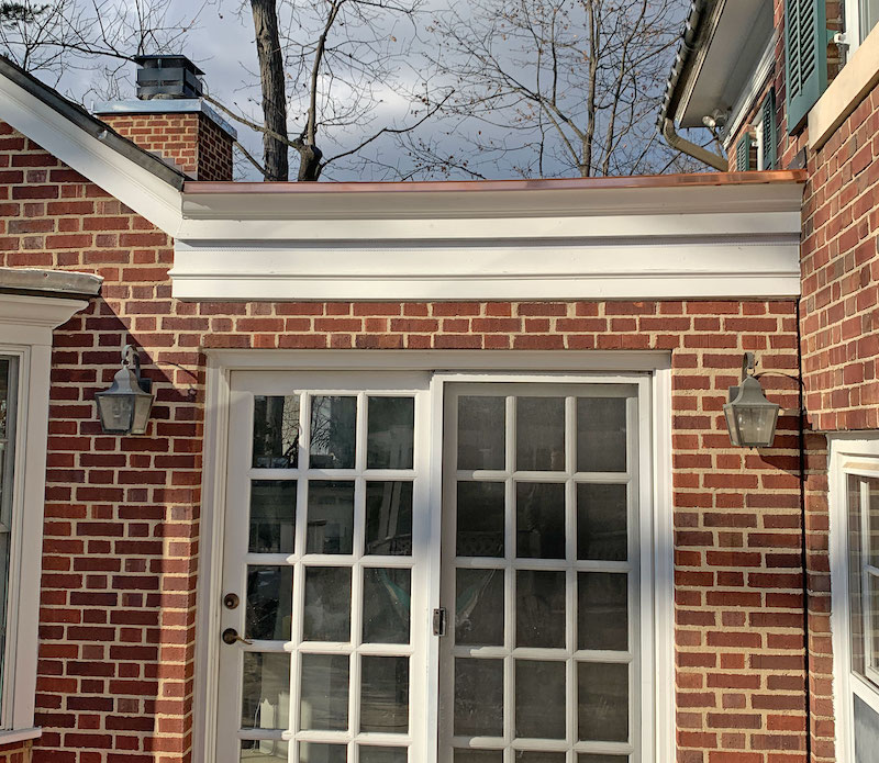 NBHD_Roofing's tweet photo. To avoid excessive water pooling, we installed a Copper scupper which allows water to drain. We also installed a cooper edging to achieve a cohesive and stylish look. #roofing #roof See the full project: https://t.co/zo5TFc1wvS https://t.co/CQccMT3EYi