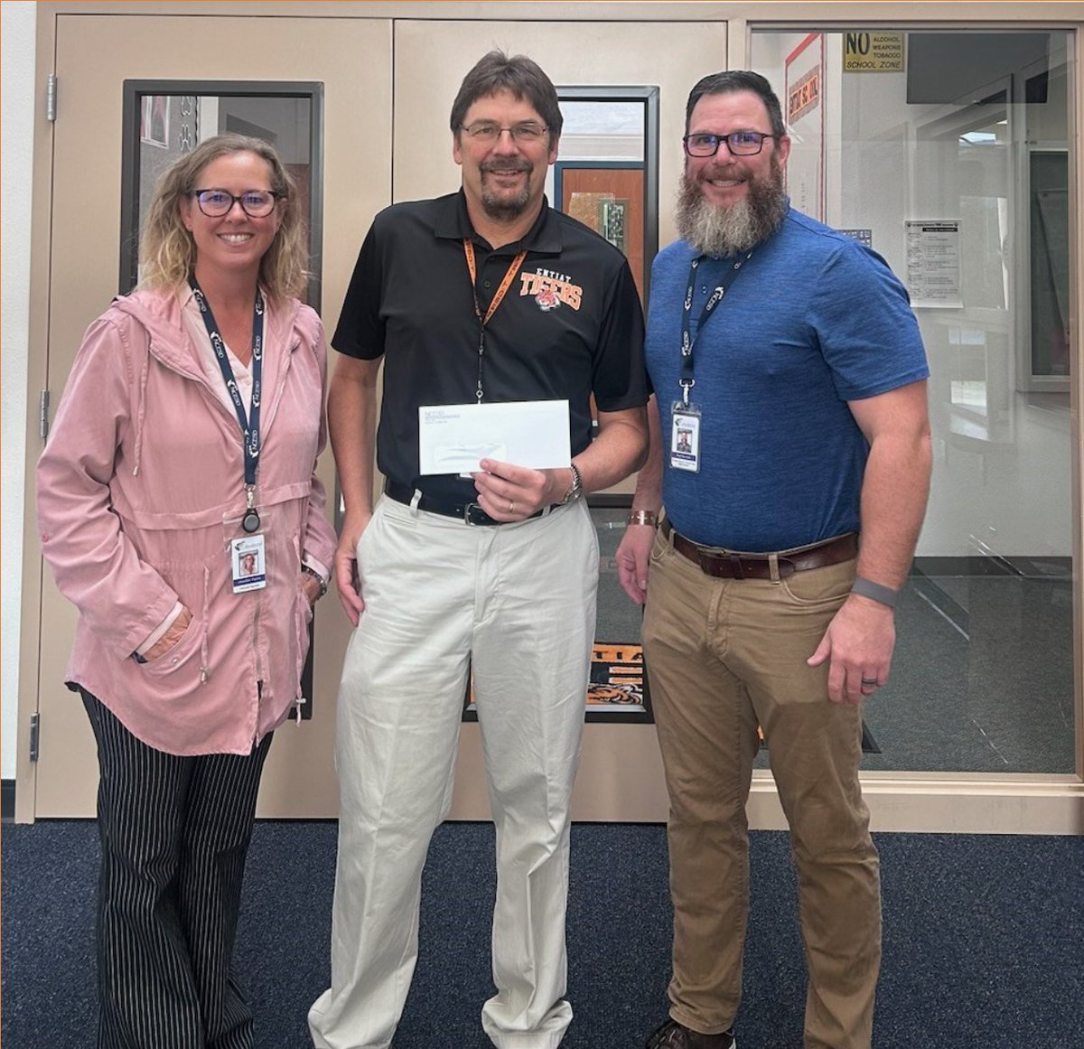Workers Compensation Managing Director, Paul Harrison, and Loss Control Specialist, Jenny Payne, presented a $2,500 check to Entiat School District and Superintendent, Greg Whitmore, as part of an incentive program ensuring a safe workplace and learning environment. #ncwschools
