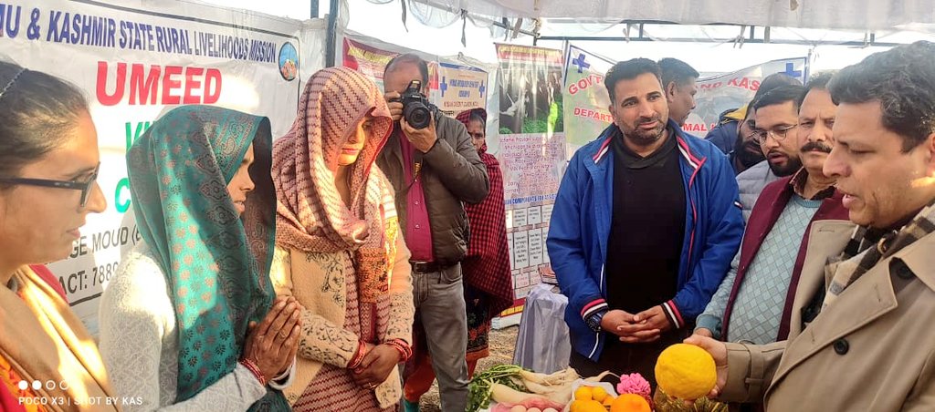 JK_NRLM's tweet photo. #ViksitBharatSankalpYatra 
 Commissioner Secretary (GAD) Sh.Sanjeev Verma ,DDC Chairperson Sh. Lal Chand  visited the stalls setup by Self help group members of JKRLM during #VBSY Program at Pyt.Chirdi of Block Narsoo,District Udhampur. @OfficeOfLGJandK @listenshahid @indukanwal https://t.co/RDLobTwxbx