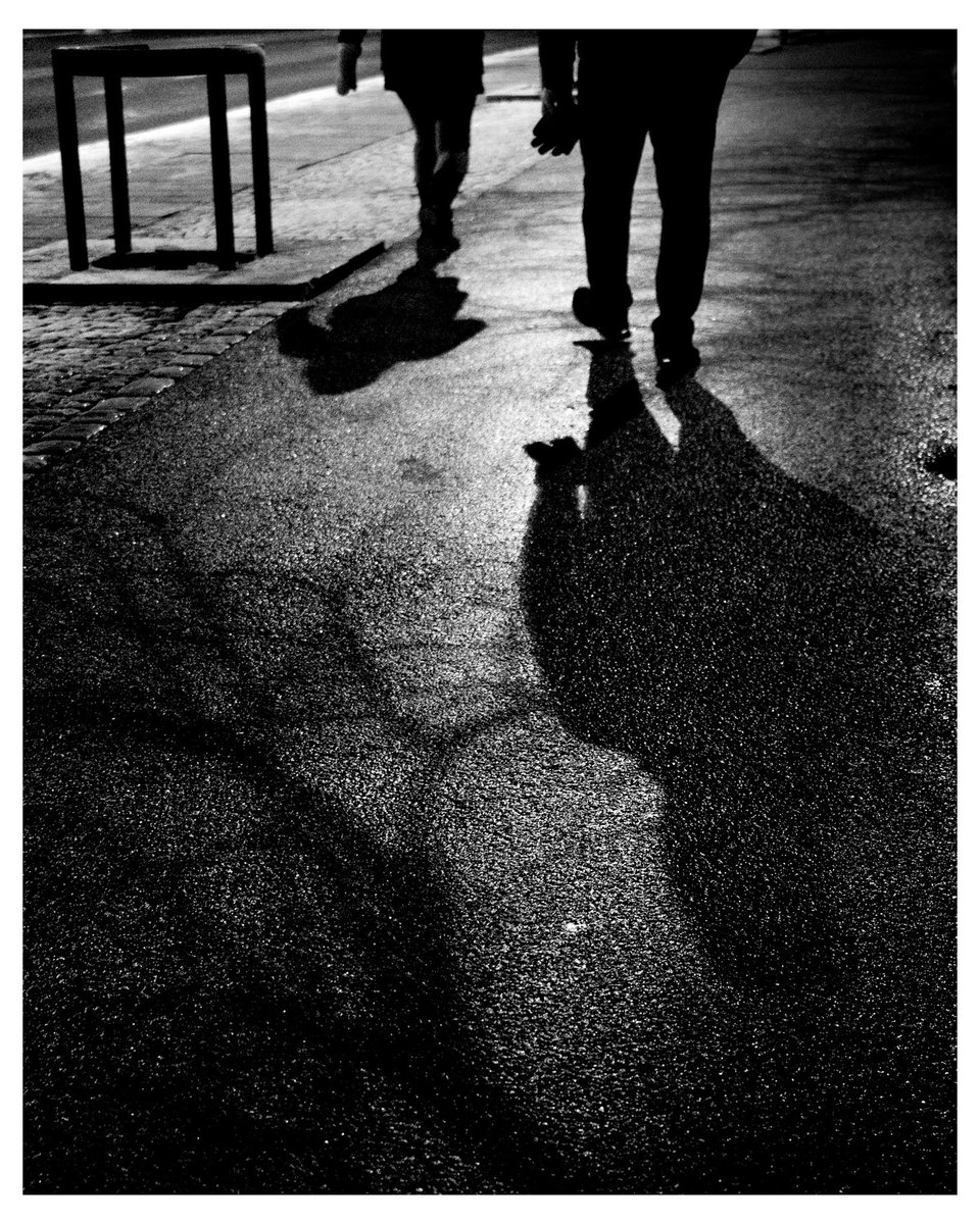 “Walking to work followed by our shadows”