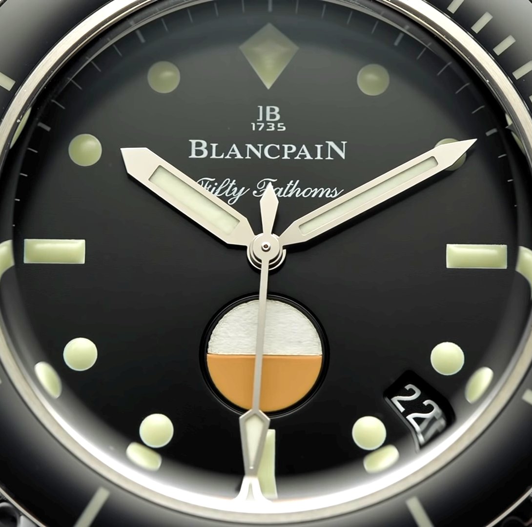 The Blancpain Fifty Fathoms Automatique ~ Functions: Date - Water Resistance Indicator – Rotating Bezel ~ Case: 40.3mm – Stainless Steel – 13mm Thick ~ Water Resistance: 300M ~ Movement (1151) 100-Hour Power Reserve –Automatic–21,600 vph Frequency – 28 Jewels ~ MSRP: £13,100