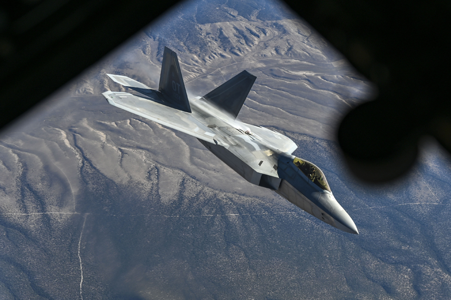 #photooftheday
aerotechnews.com/photoarchive/ 
An F-22 Raptor departs after receiving fuel from a KC-135 Stratotanker assigned to the 92nd Air Refueling Wing during the Weapons Integration course over the Nevada Test and Training Range ...