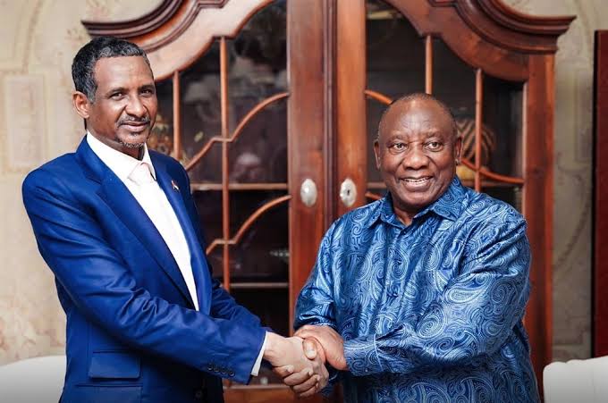 baytifirasik's tweet photo. Mohamed Hamdan Dagalo, Sudanese Arab 'Janjaweed' leader, guilty of genocide, mass rape &amp; other crimes against the indigenous Fur people of Darfur.

Here he is with his friend, the President of South Africa, Ramaphosa, who claims to stand against genocide on behalf of Hamas. https://t.co/XRw0lITVjB