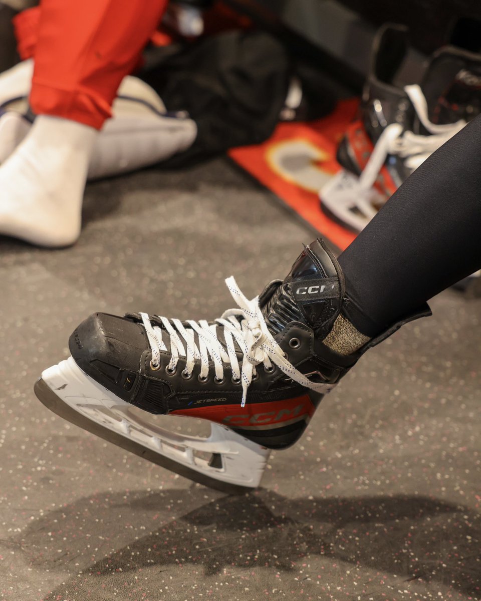 NHLFlames's tweet image. Peter Mangiapane, going with the ankle wrap-around lace job!