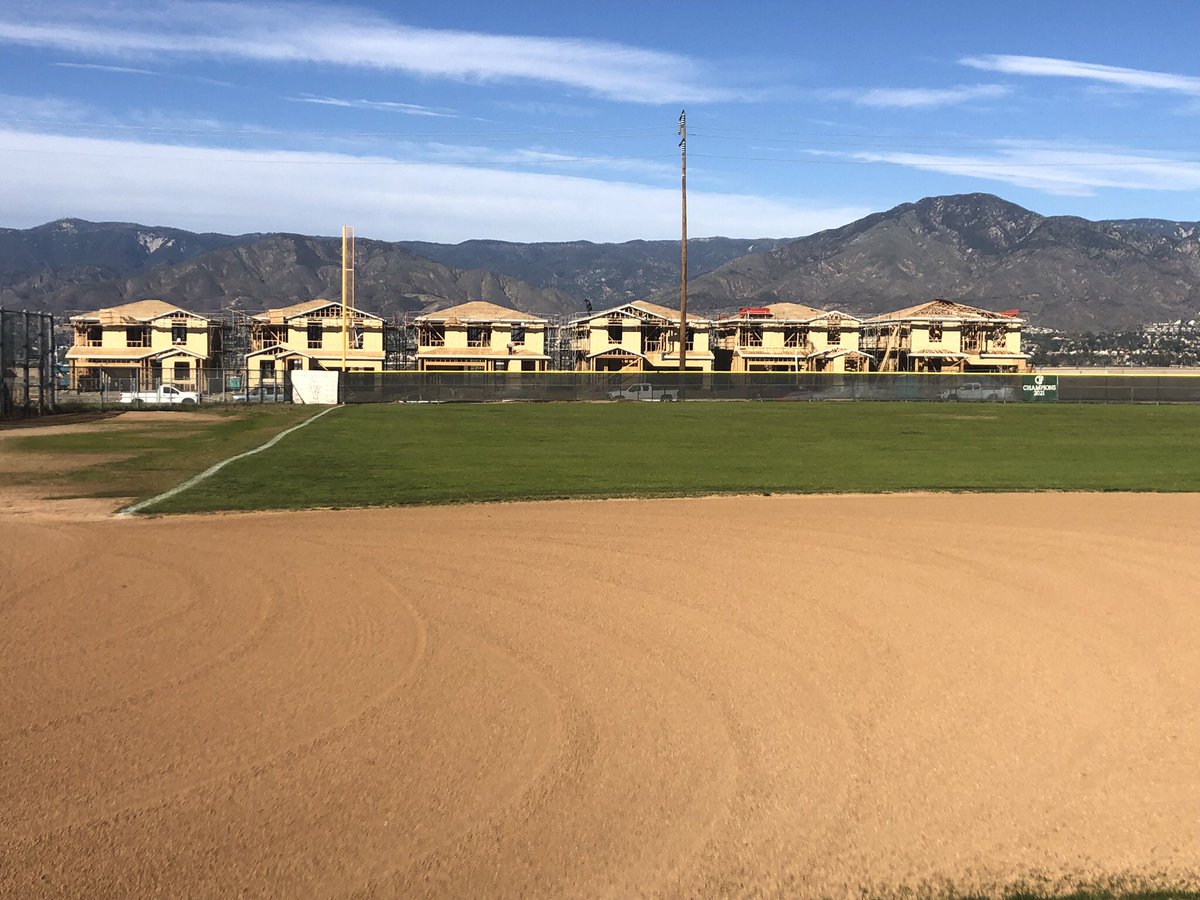 CVBHawkBaseball's tweet photo. Citrus Valley ⚾️ is getting a new background view over the left field fence. #OrangeGroves 🍊are gone and #Homes 🏠 are taking over. Hope the #Hawks will still #flyby #WErCV #TeamCV #PoundTheStone #Family #TheValley https://t.co/tDp5TORrUt