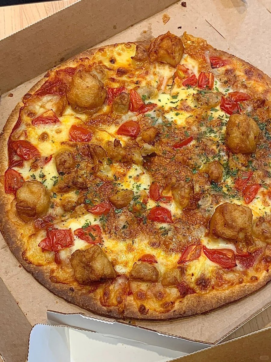 "Indulging in the cheesiness and deliciousness of pizza tonight!
