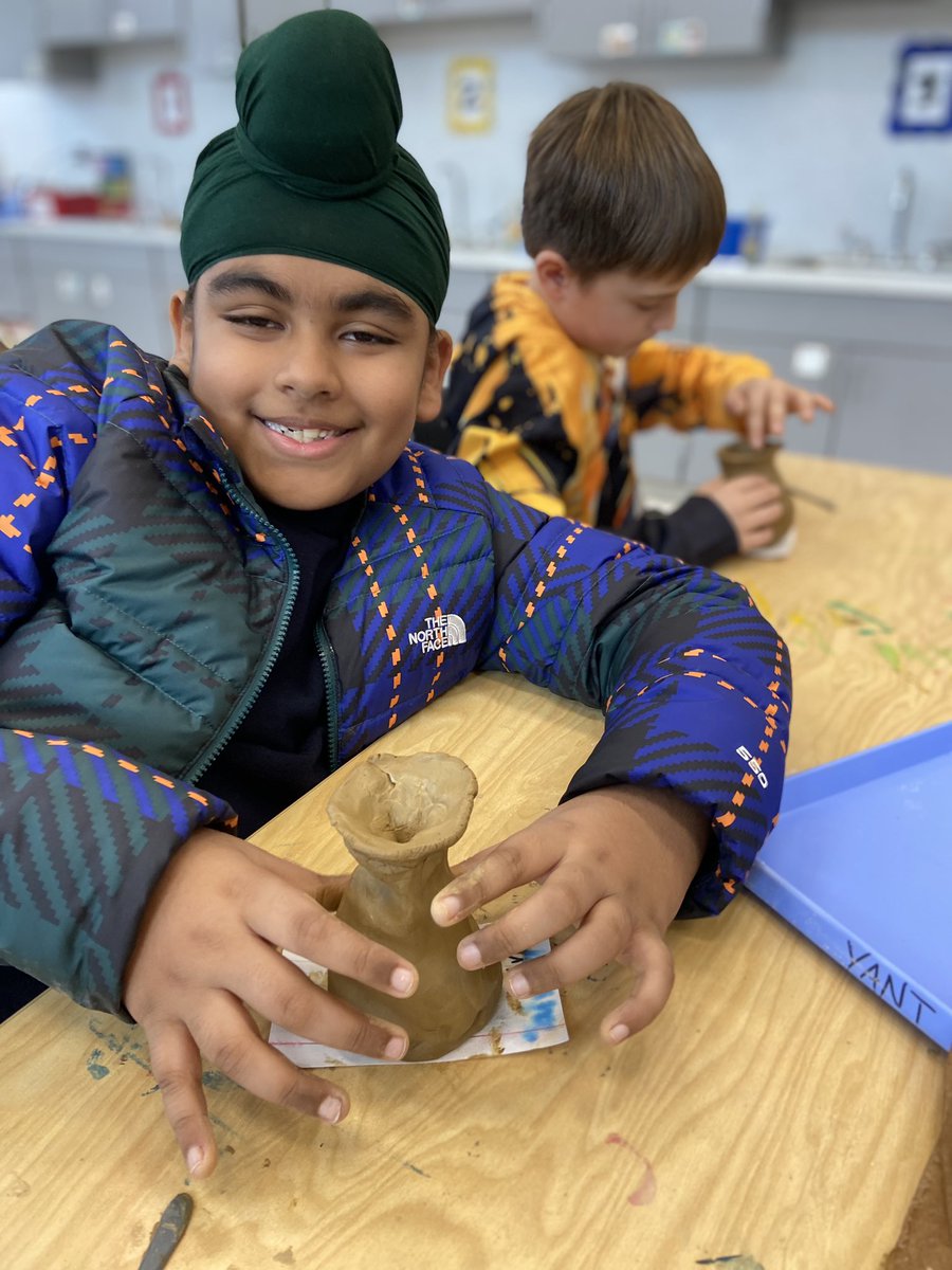 BNearhoofMES's tweet photo. Hand building pottery today in 4th grade. Can’t wait to see these little vases fired and glazed. #MESRocks https://t.co/sk5evx8h2b