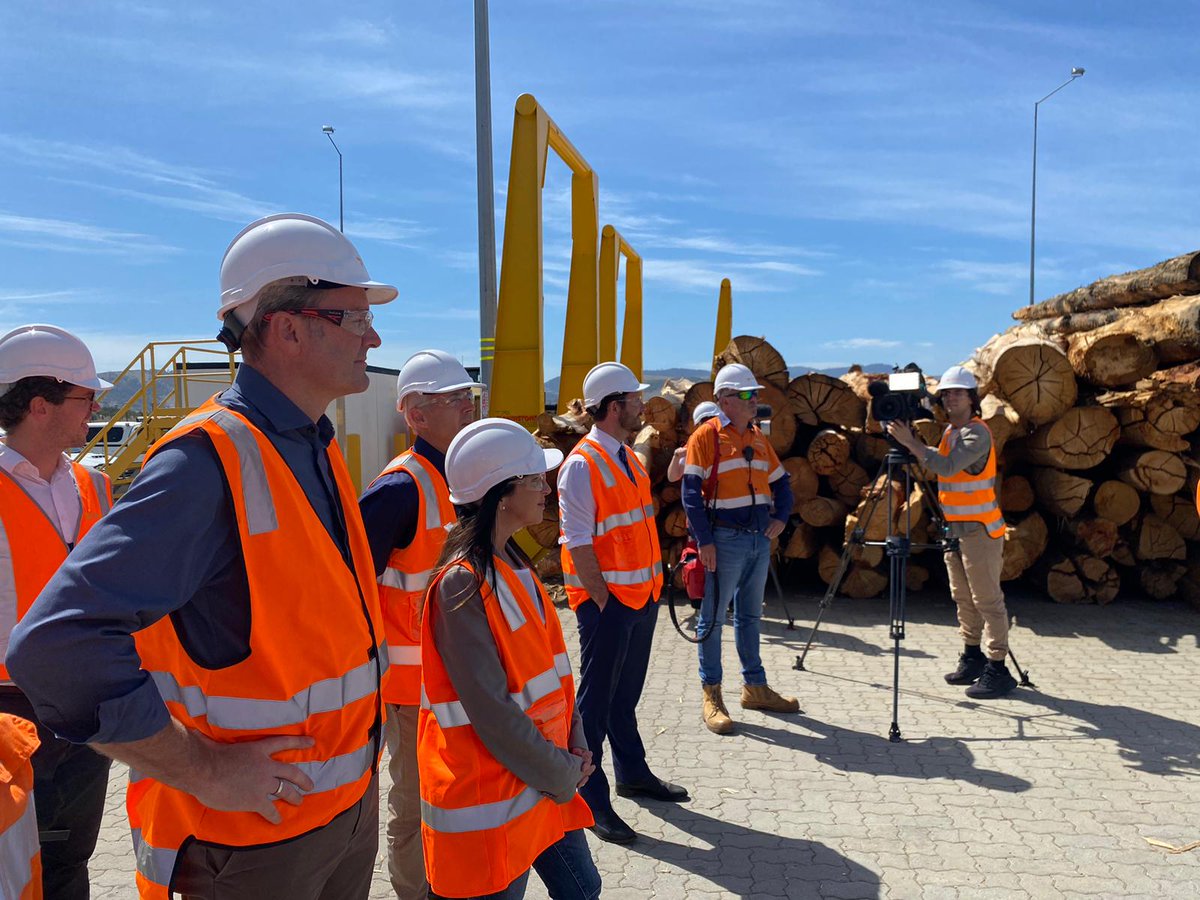 RockliffTeam's tweet photo. @fergusonmichael, @felix_ellis and @JaneHowlettMLC out in Brighton today with workers hearing about the major transformation that's happening in Tasmanian log transport with a 10-fold increase in logs transported on rail over the past 10 years. https://t.co/cyy9lJNcT3