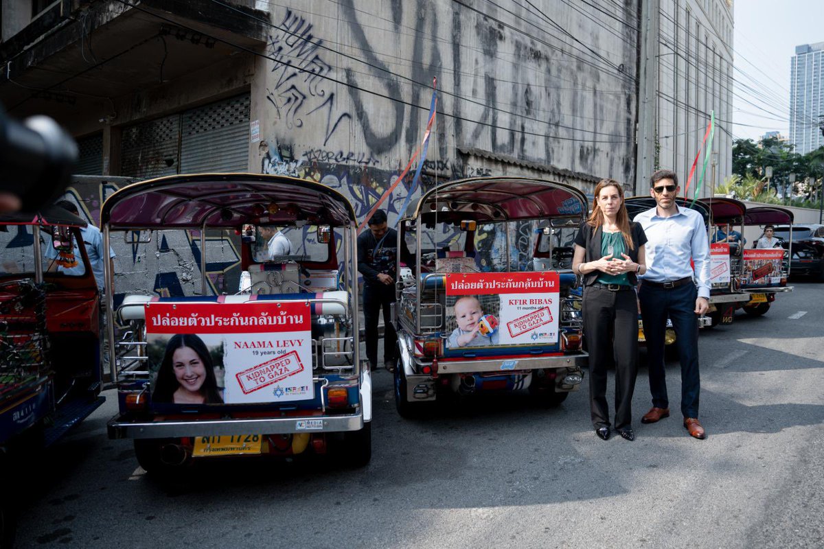 osagiv's tweet photo. #BringThemHomeNow!

Today, the Israeli Embassy in Thailand launched a special campaign in #Bangkok , calling for the immediate release of all remaining hostages held in the Gaza Strip. 

During the campaign, 100 TukTuk vehicles, bearing the faces of hostages, with writing in Thai and English, will be driving around major streets in Bangkok. 

More than 130 hostages, including eight Thais, still remain hostage by Hamas-ISIS in the Gaza Strip. Among them are babies, young children and elderly men and women. 

Sunday, January 14, will mark the 100th day since they were abducted, after an inhumane attack by Hamas terrorists against Israel on October 7. 

The international community must do everything to bring them all home today.

@IsraelinTH @IsraelMFA