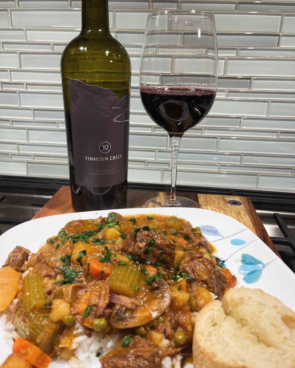 A warming meal for the cold weather - beef stew with lots of veggies, garnished with parsley from the garden and paired with a lovely <a href="/tinhorncreek/">Tinhorn Creek</a> 30th year celebration red wine #meritage #redwine #wine #bcwine #okanagan #foodandwine #food #homecooking