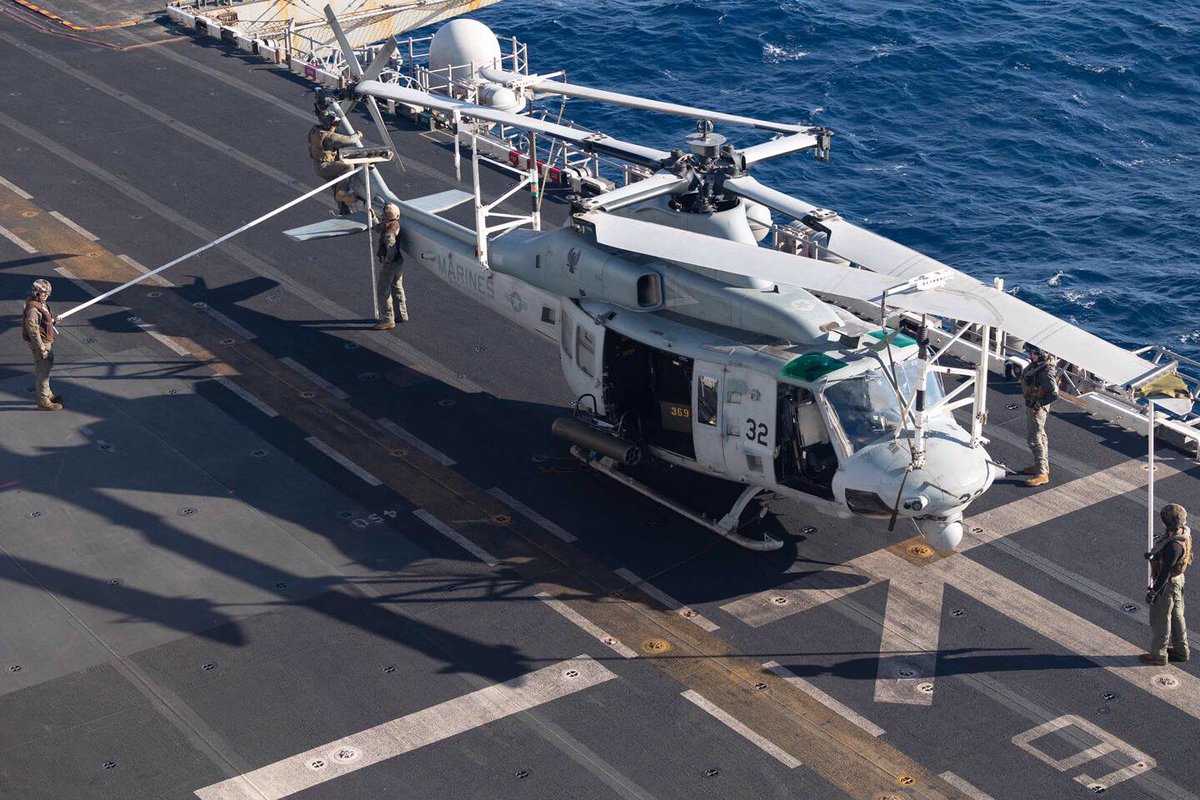 Boneyardsafari's tweet photo. It is impressive the storage system for the blades of the Venom.  Here is #UH1Y 169239 of #VMM162 being prepared for flight aboard USS Bataan #LHD5 last week in the Mediterranean.  #ussbataan #usmc #marineaviation #navalsafari #aviationsafari #aviationpreservation #boneyardsafari https://t.co/MpRQyuXm1t