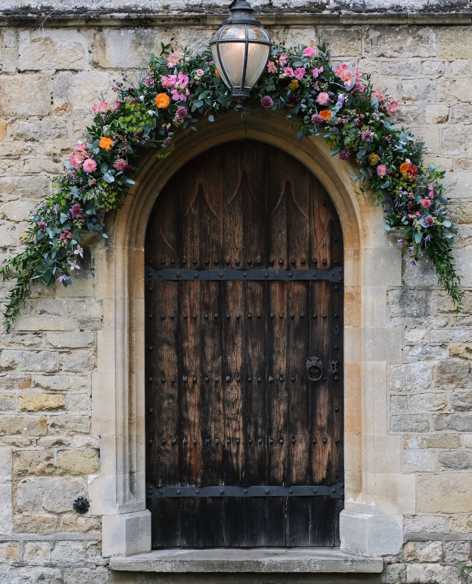 The entrance to Notley Abbey lends itself to having a beautiful arch of fresh flowers above the door and is an excellent option for group our couple photos. 

#weddingdecor #weddingflowers #weddingflorist #weddingstyling #weddingfloraldesign #weddingarch #flowerarch