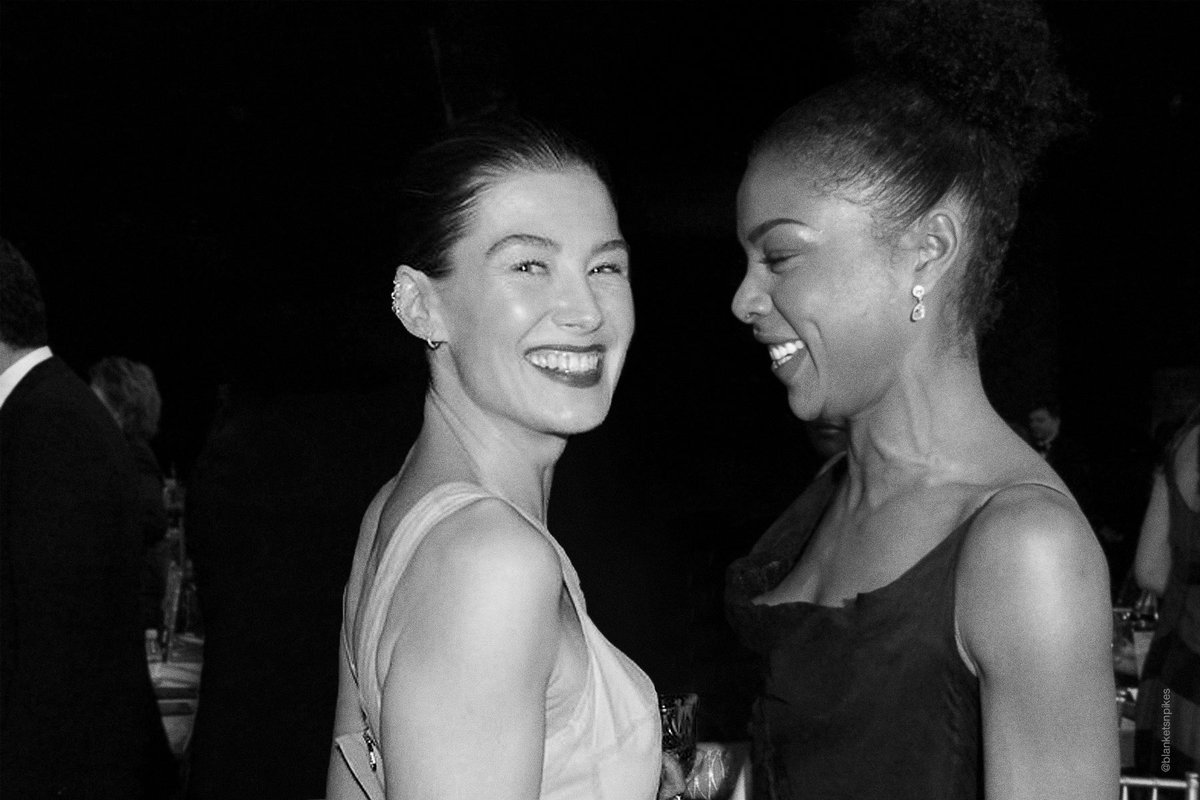 blanketsnpikes's tweet photo. rosamund was having the best night of her life at the golden eve party https://t.co/PjKEToeM7B