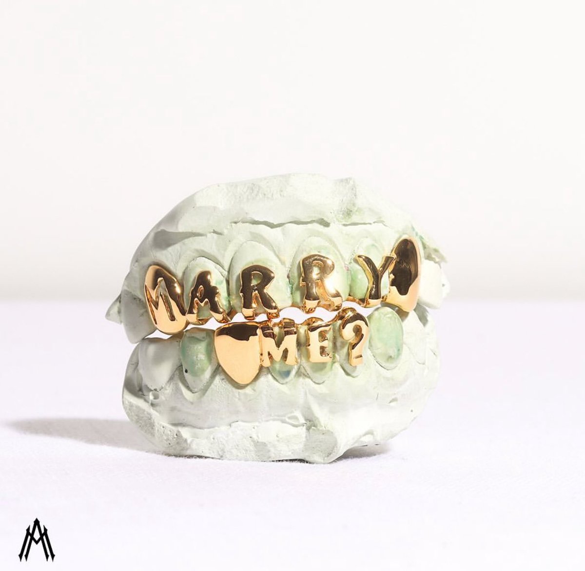 Things We’re Loving: ASAP Rocky’s “Marry Me” Grill by Alex Moss ❣️